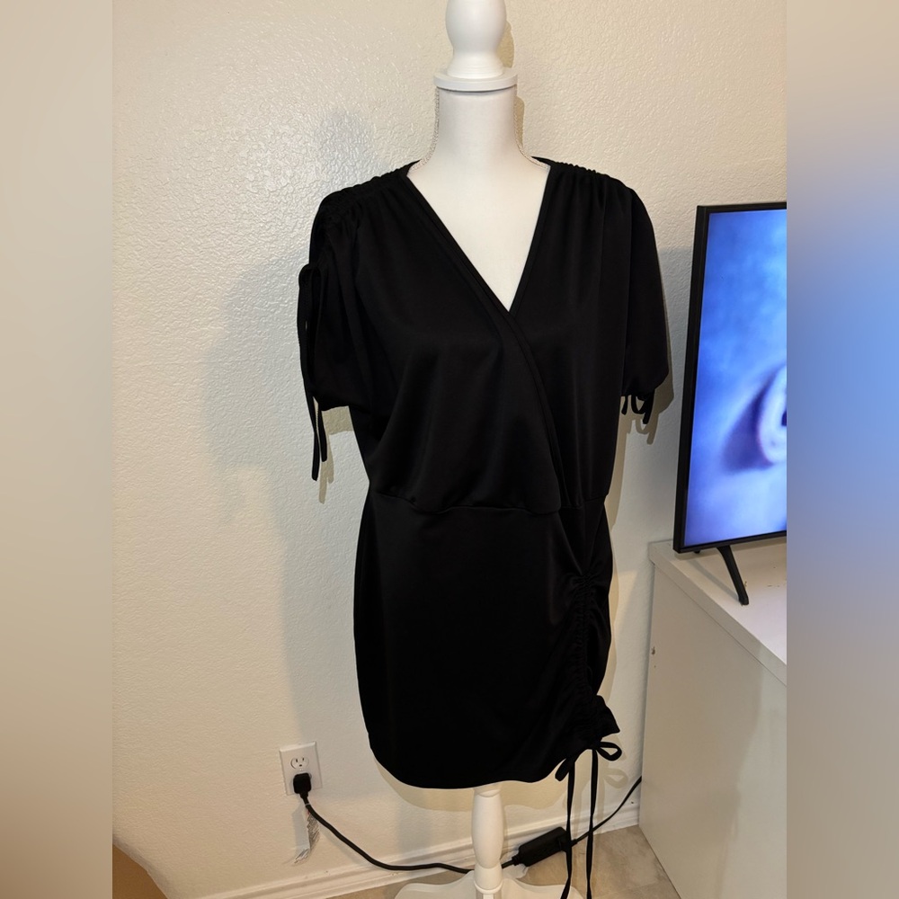 BloomChic Black Mini Dress with Ruched Detail